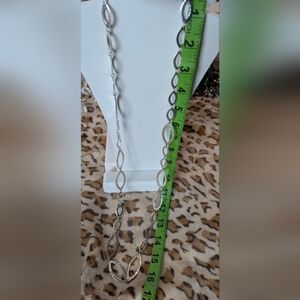 Vintage long hammered silver necklace. Adjustable and can wrap for multi look